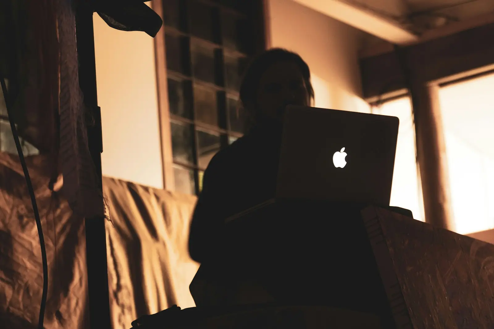 Business owner working on a laptop at a desk